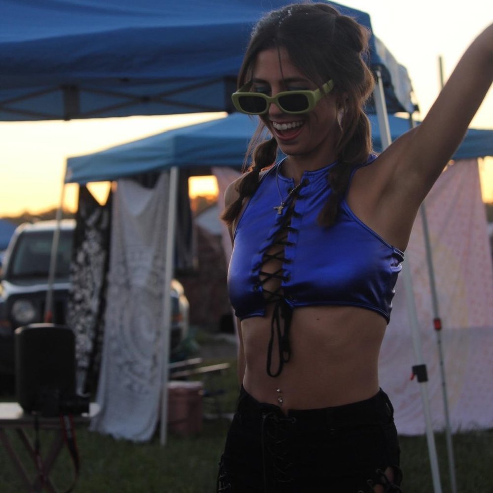 Club Exx electric metallic blue and black lace up crop top